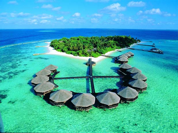 Choose between overwater bungalows or beachfront villas at Baros. Photo by Maldives Resorts Special Offers, flickr