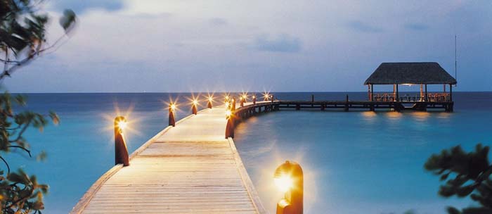 Lights line the dock at Cocoa Island Resort. Photos by mostamazingpicturesever.com