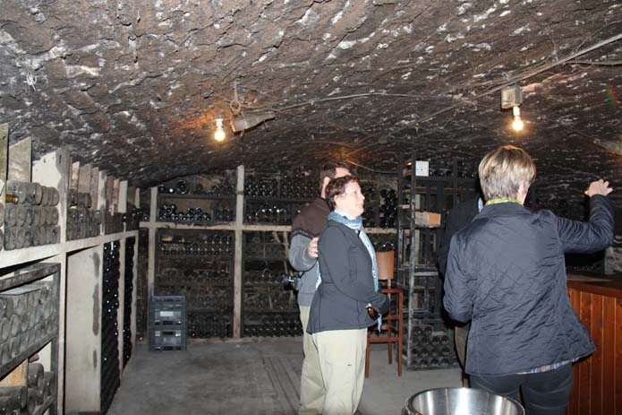 Visit wine cellars bursting with history. Photo by burgundydiscovery.com