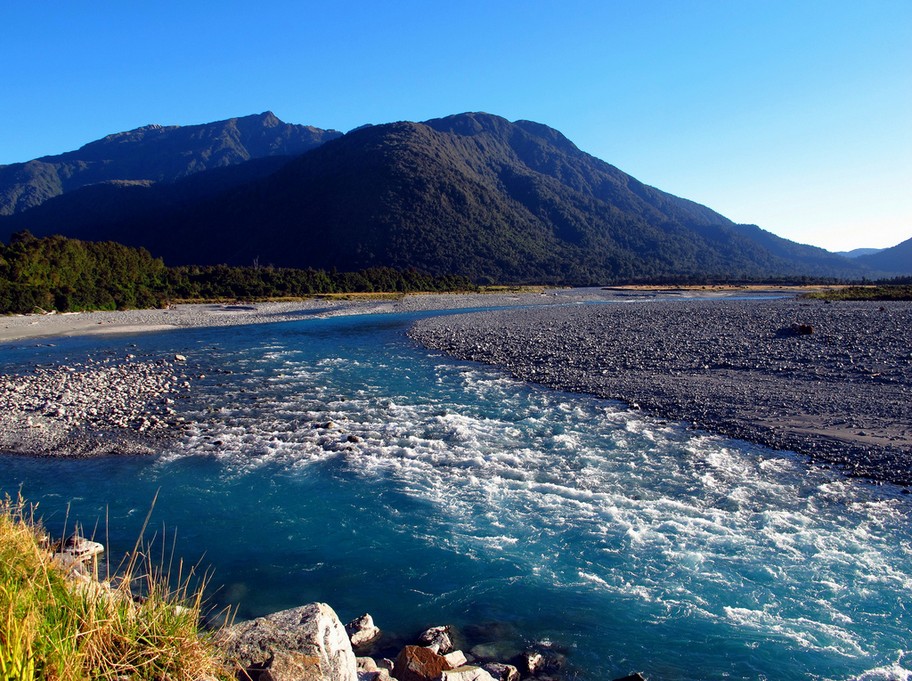 The greatest drives in the world: Highway 6 crosses over Whataroa River. Photo by Mark in New Zealand, flickr