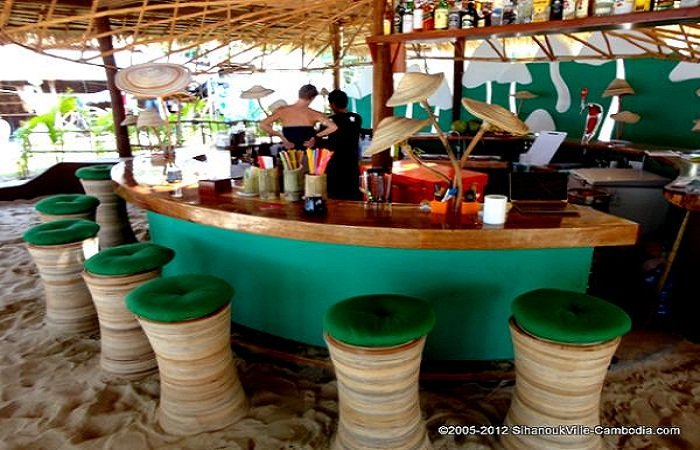 Have a drink in one of the many quirky beachside bars. Photo by sihanoukville-cambodia.com
