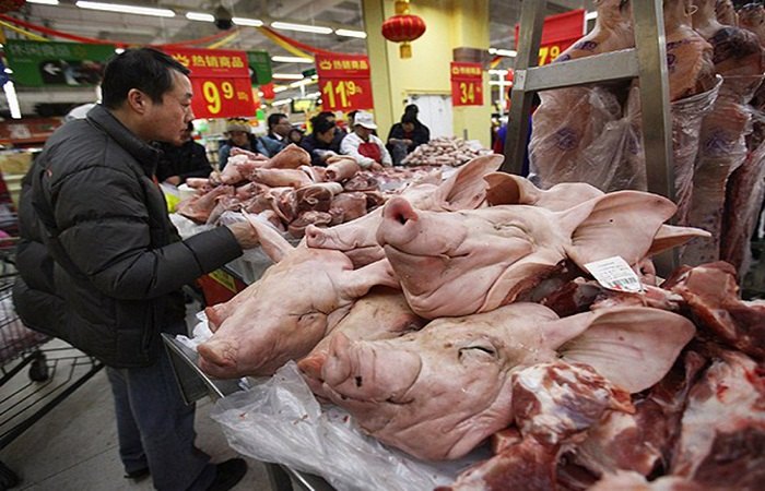 A Chinese pork market. Photo by, businessinsider.com
