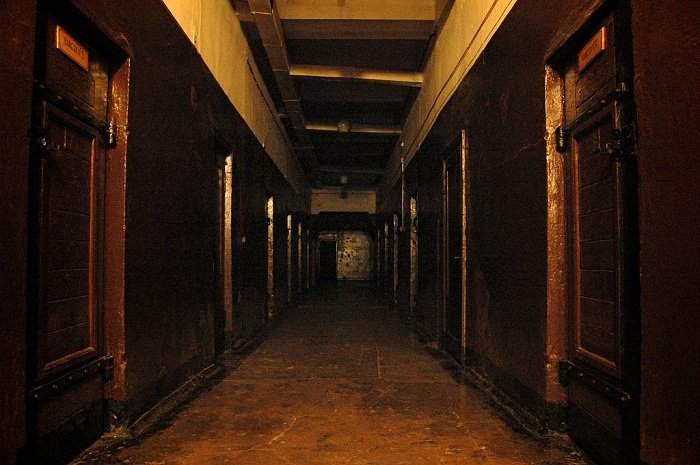 The eerie interior of the Karosta Prison Hotel in Latvia. Photo by pegasoreise, flickr