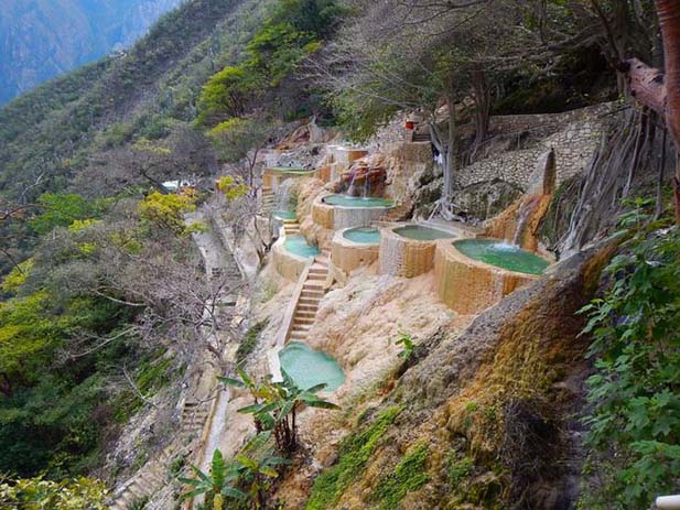 Grutas de Tolantongo, man made and natural springs. Photo via songoftheroad